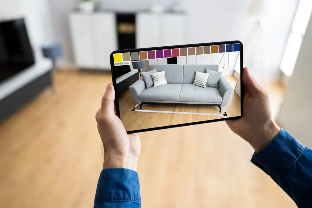 User viewing a virtual sofa in AR to choose furniture colors at home