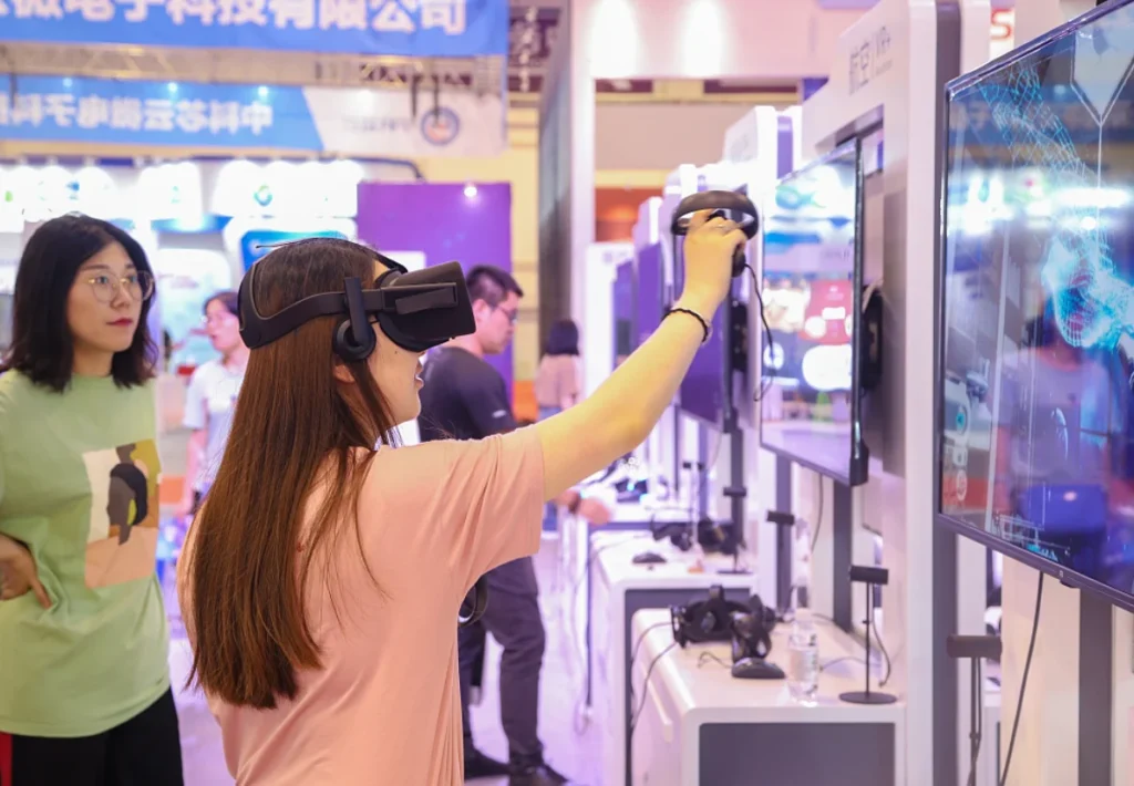 Young woman testing VR shopping demo at a tech expo in China