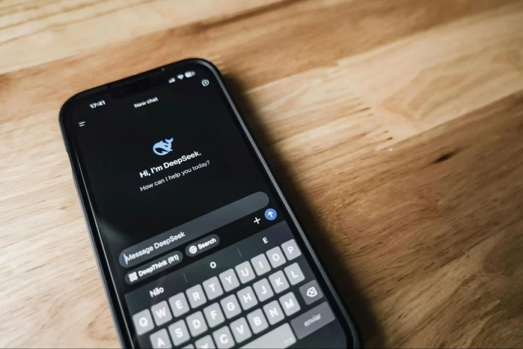 Smartphone displaying an AI assistant chat interface, representing conversational product discovery and shopping support.