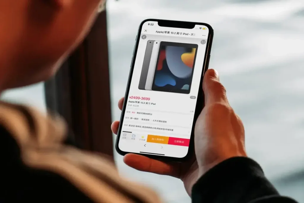 User browsing tablet product page on a smartphone shopping application