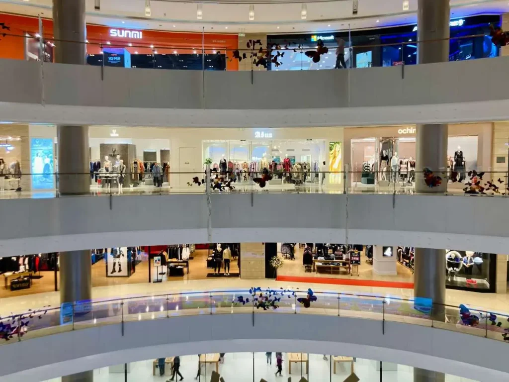 Multi-level shopping mall with sustainable retail fashion stores