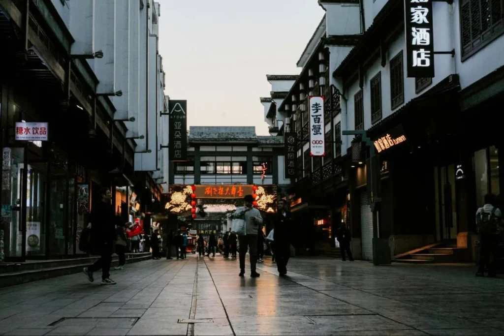 Pedestrian retail street in China, highlighting how public accountability shapes consumer trust in brands.