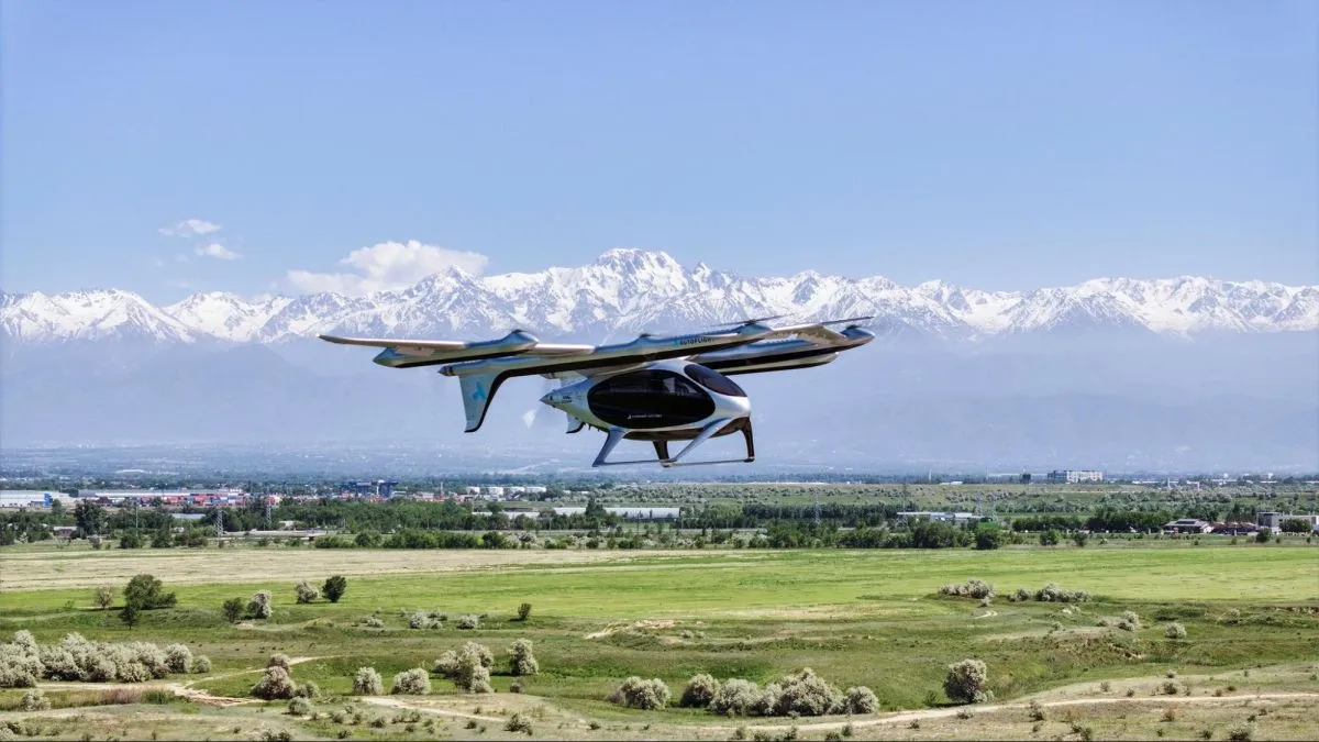 Electric aircraft flying over a mountain landscape, representing China's push into advanced technology sectors.