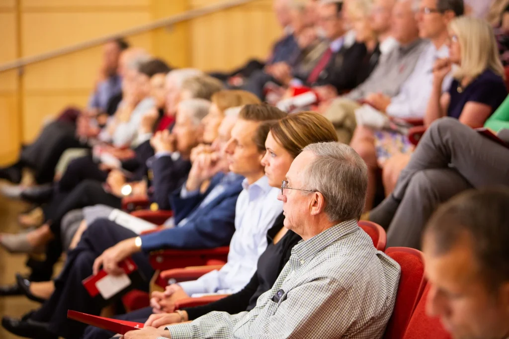 Executives listening at conference