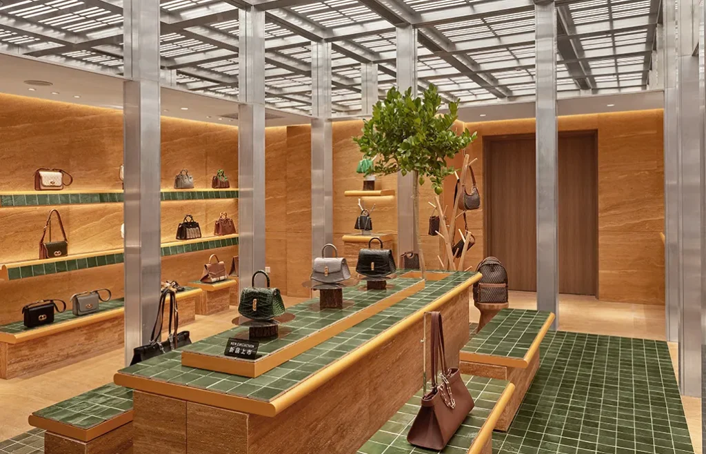 Luxury DISSONA handbag display inside a retail store