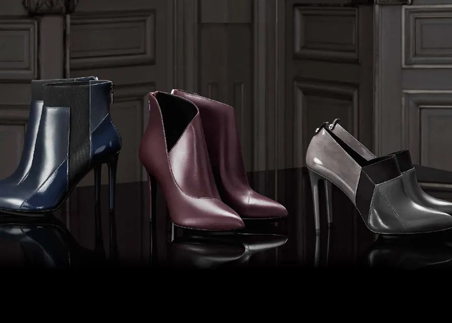 DISSONA leather ankle boots in dark luxury styling