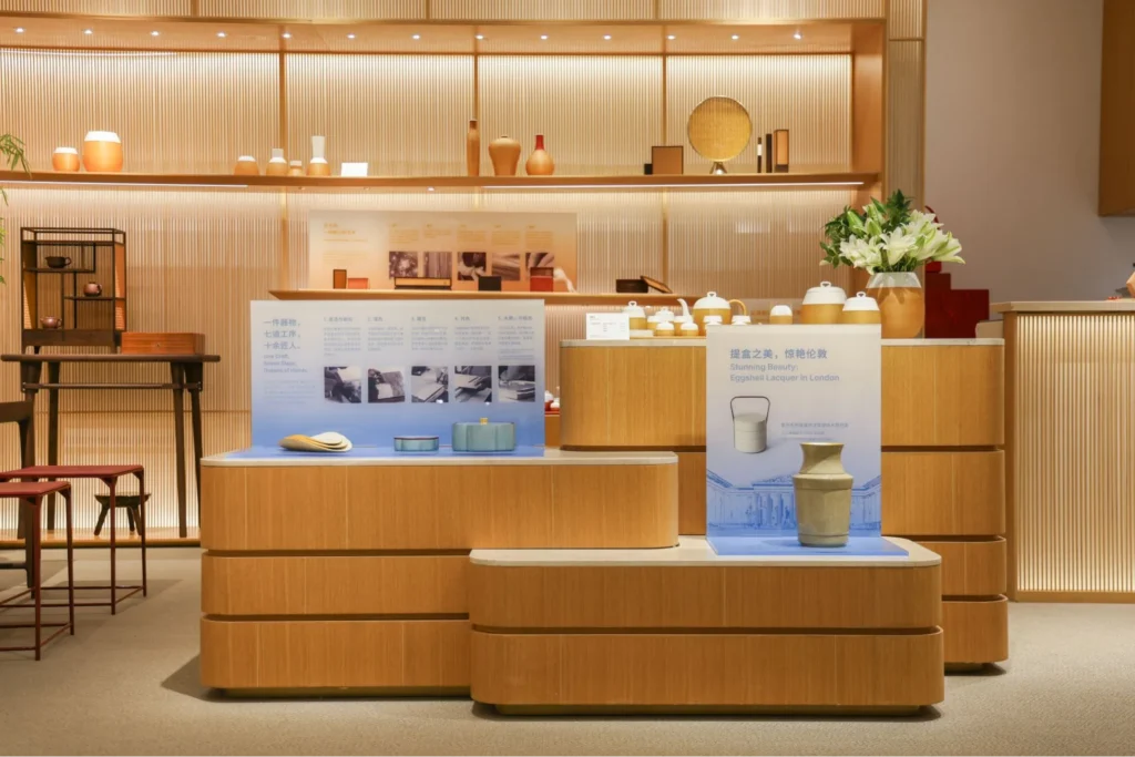 Luxury fashion display featuring designer clothing and accessories