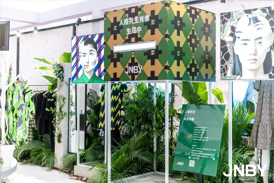 JNBY pop-up display with plants and digital portraits