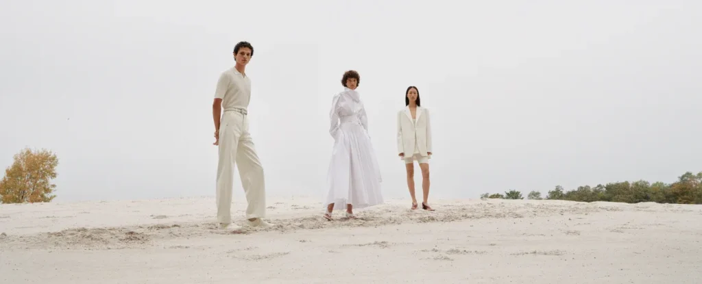Models wearing all-white outfits outdoors
