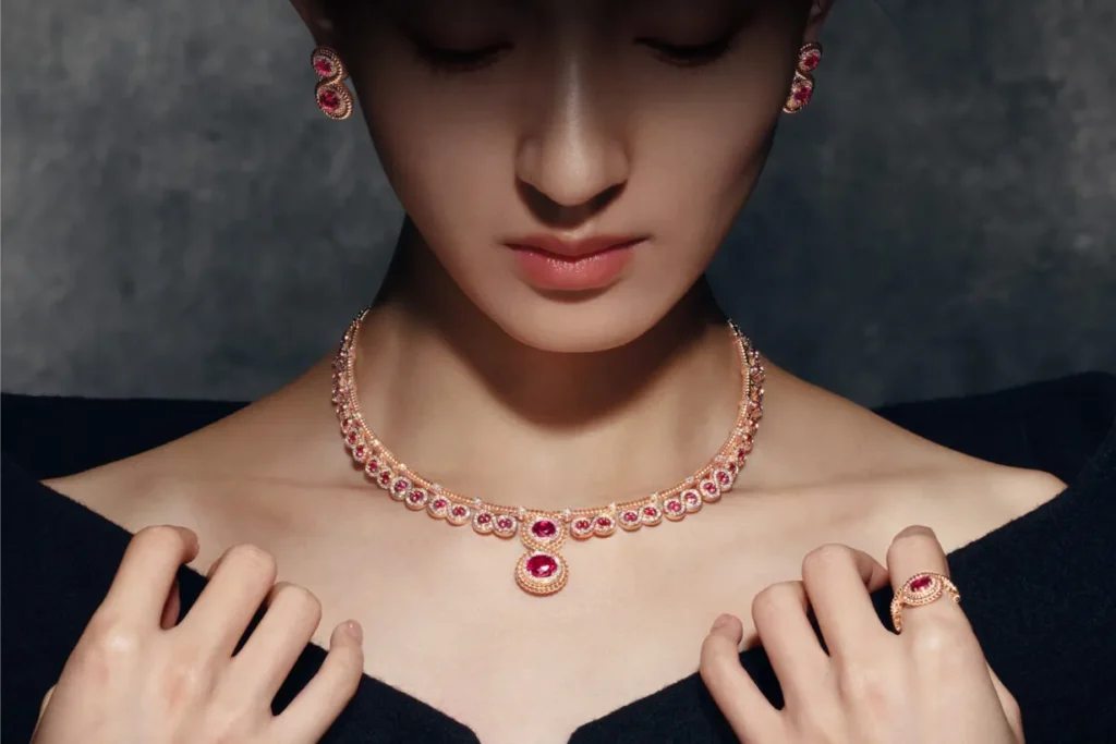 Model wearing ruby jewelry
