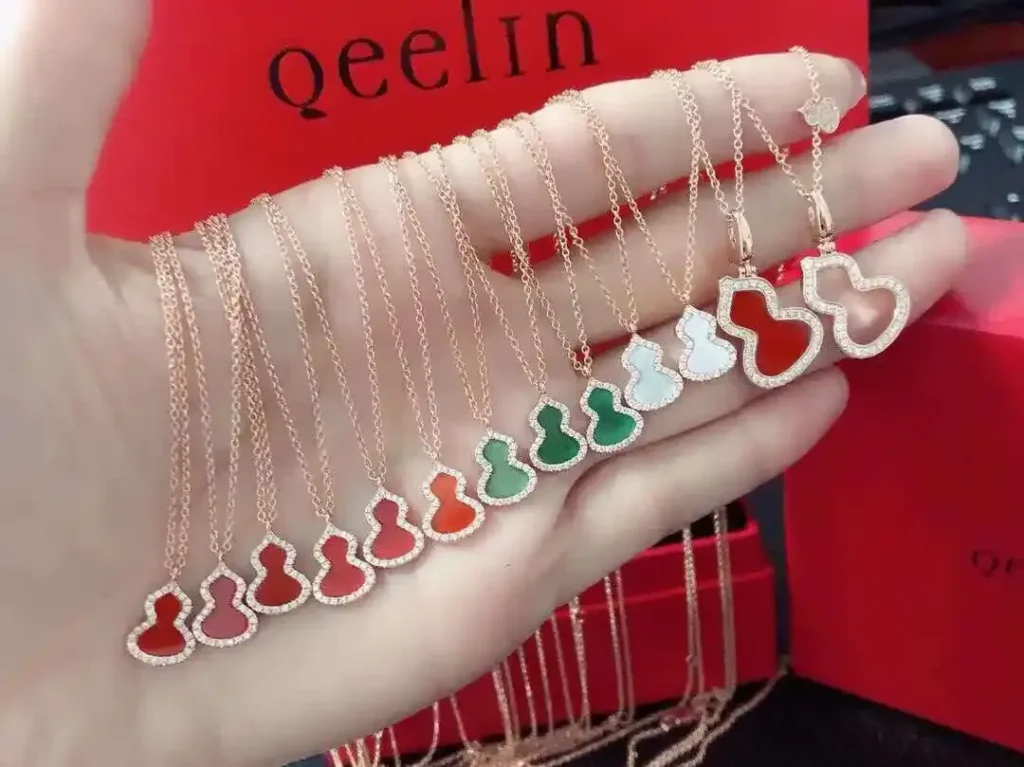 Colorful Wulu necklaces in hand