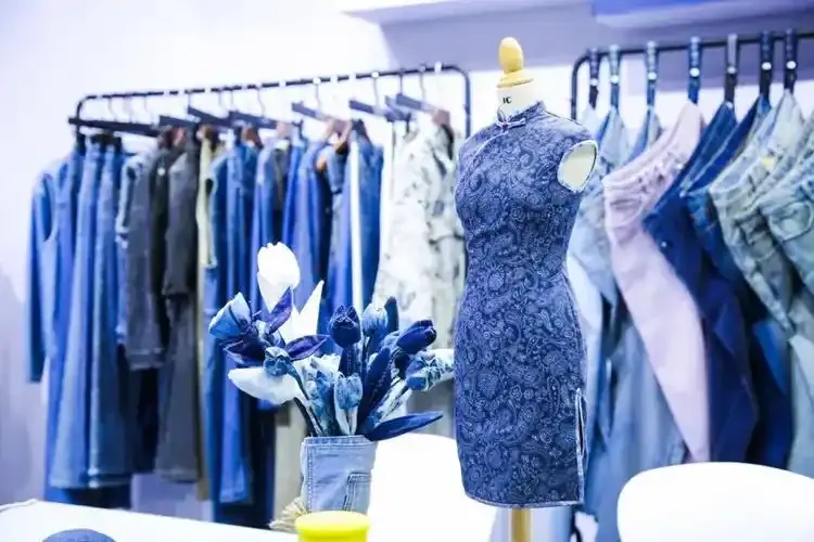 Blue qipao displayed in fashion showroom