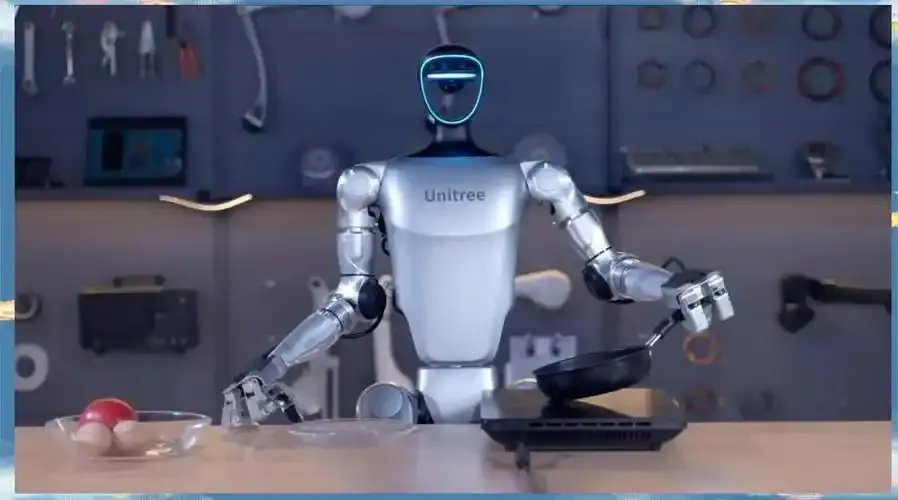 Unitree humanoid robot using a frying pan in a smart kitchen setup