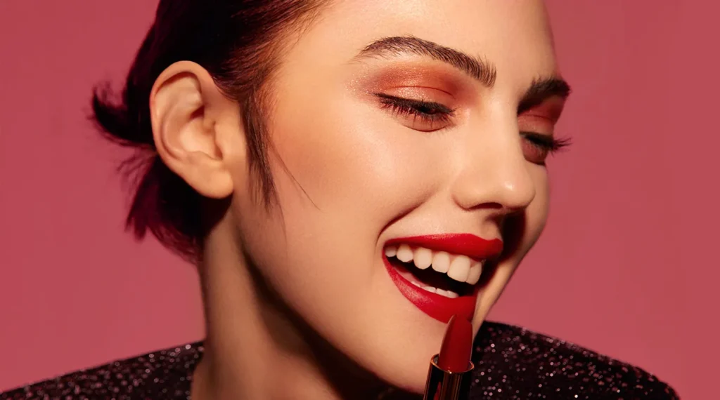 Model wearing bold red lipstick