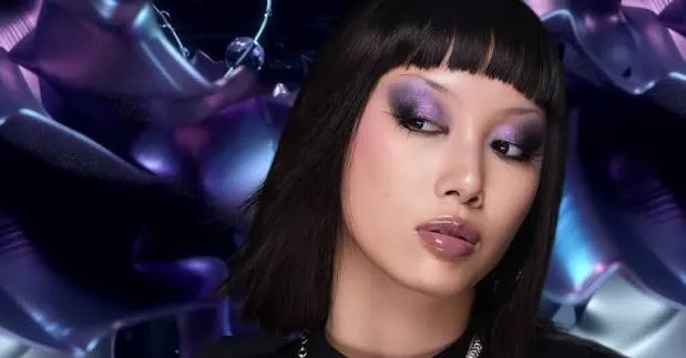 Model with dramatic purple eye makeup