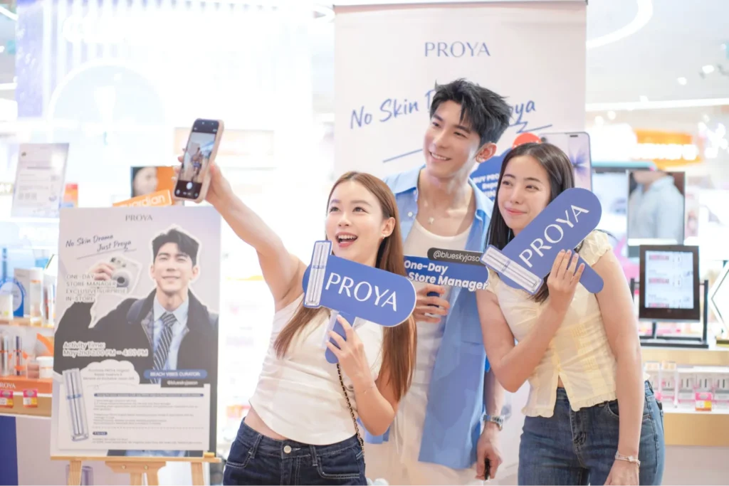 Shoppers taking a selfie at a PROYA beauty event