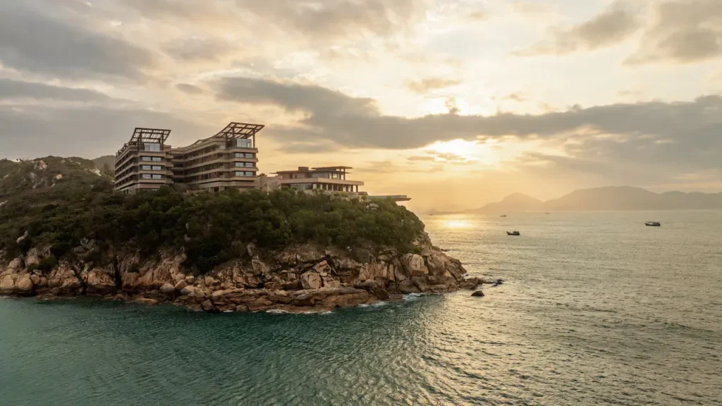 Luxury island resort overlooking the sea at sunset