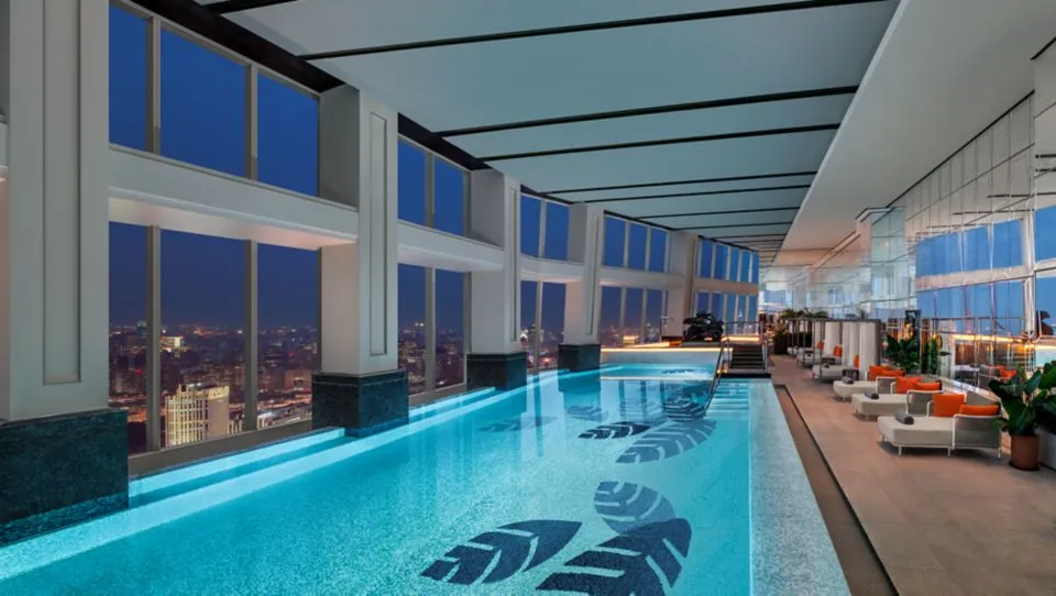 Indoor pool with panoramic Shanghai city views