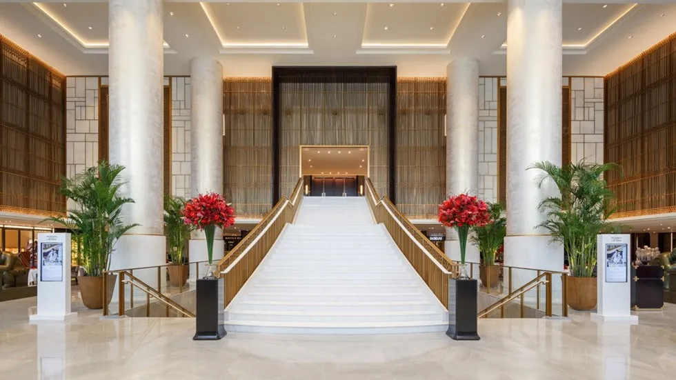 Grand staircase in The Peninsula Beijing lobby